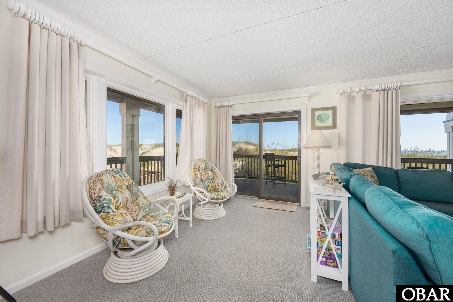 8111 South Old Oregon Inlet Road, Unit B201 Nags Head, NC 27959 - Photo 7 of 35 Sliders to Wrap Around Deck