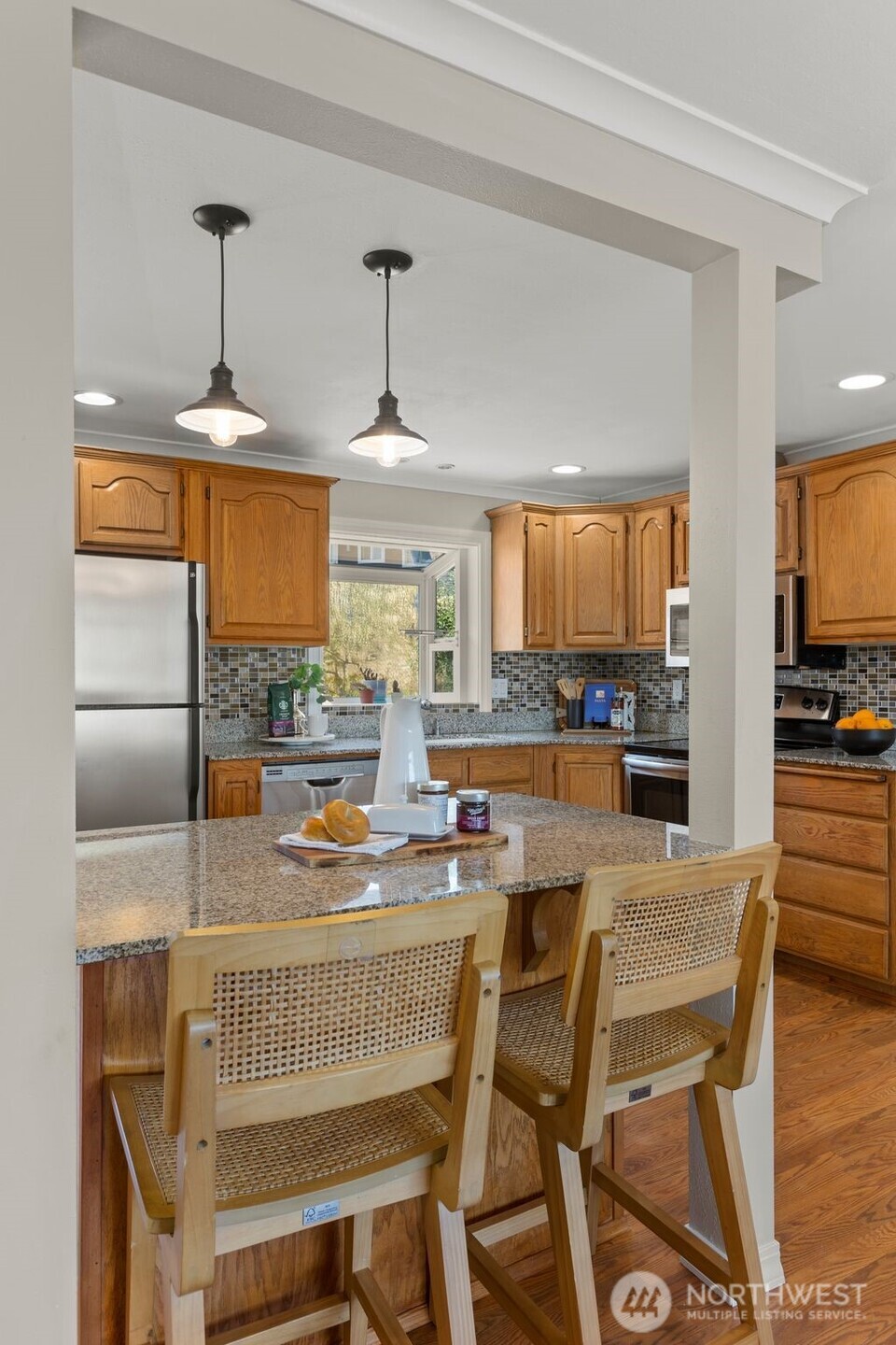 216 Bridgeway Everett, WA 98201 - Photo 13 of 40 a dining room with furniture and window