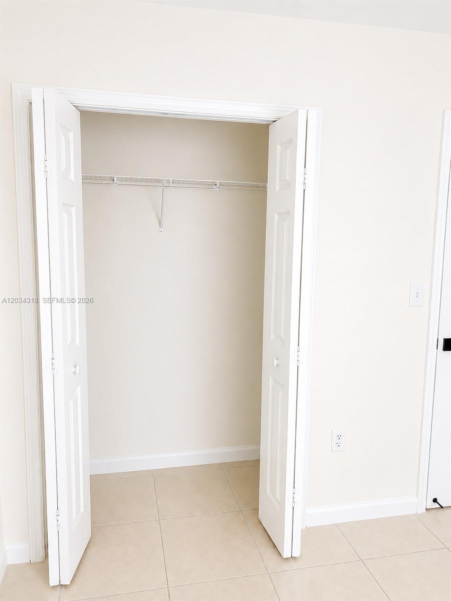 14856 Southwest 179th Street Miami, FL 33187 - Photo 24 of 33 a view of an empty room