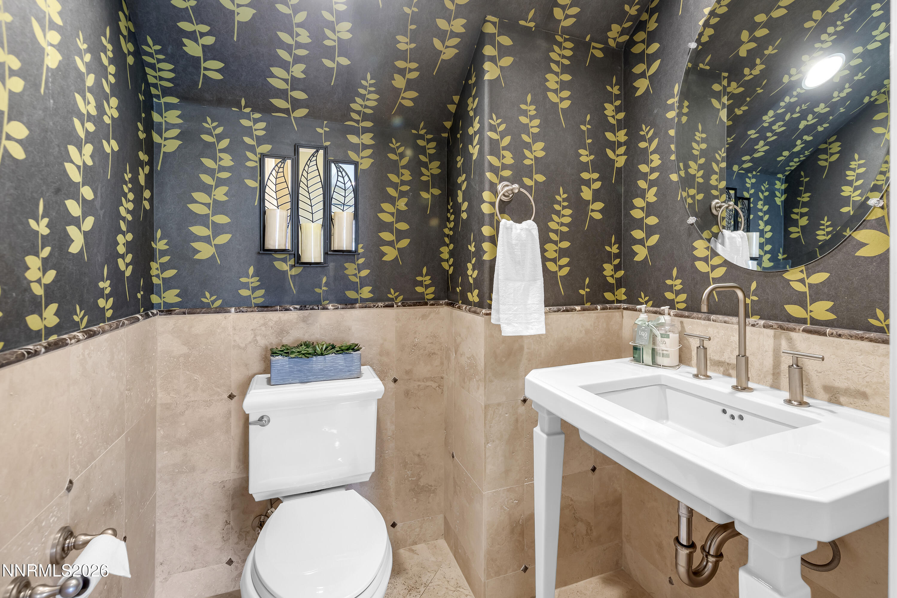 1898 Laurel Ridge Drive Reno, NV 89523 - Photo 45 of 87 a bathroom with a toilet sink and mirror