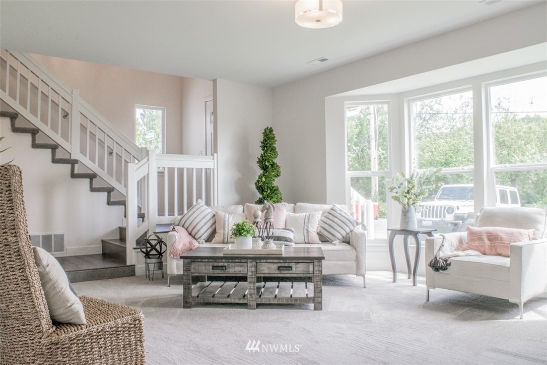 17916 Tester Road Snohomish, WA 98290 - Photo 12 of 28 a living room with furniture and a large window