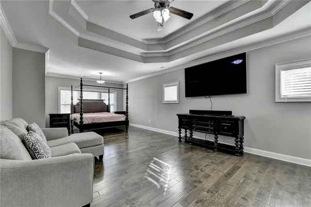 a bathroom with a double vanity sink mirror and refrigerator