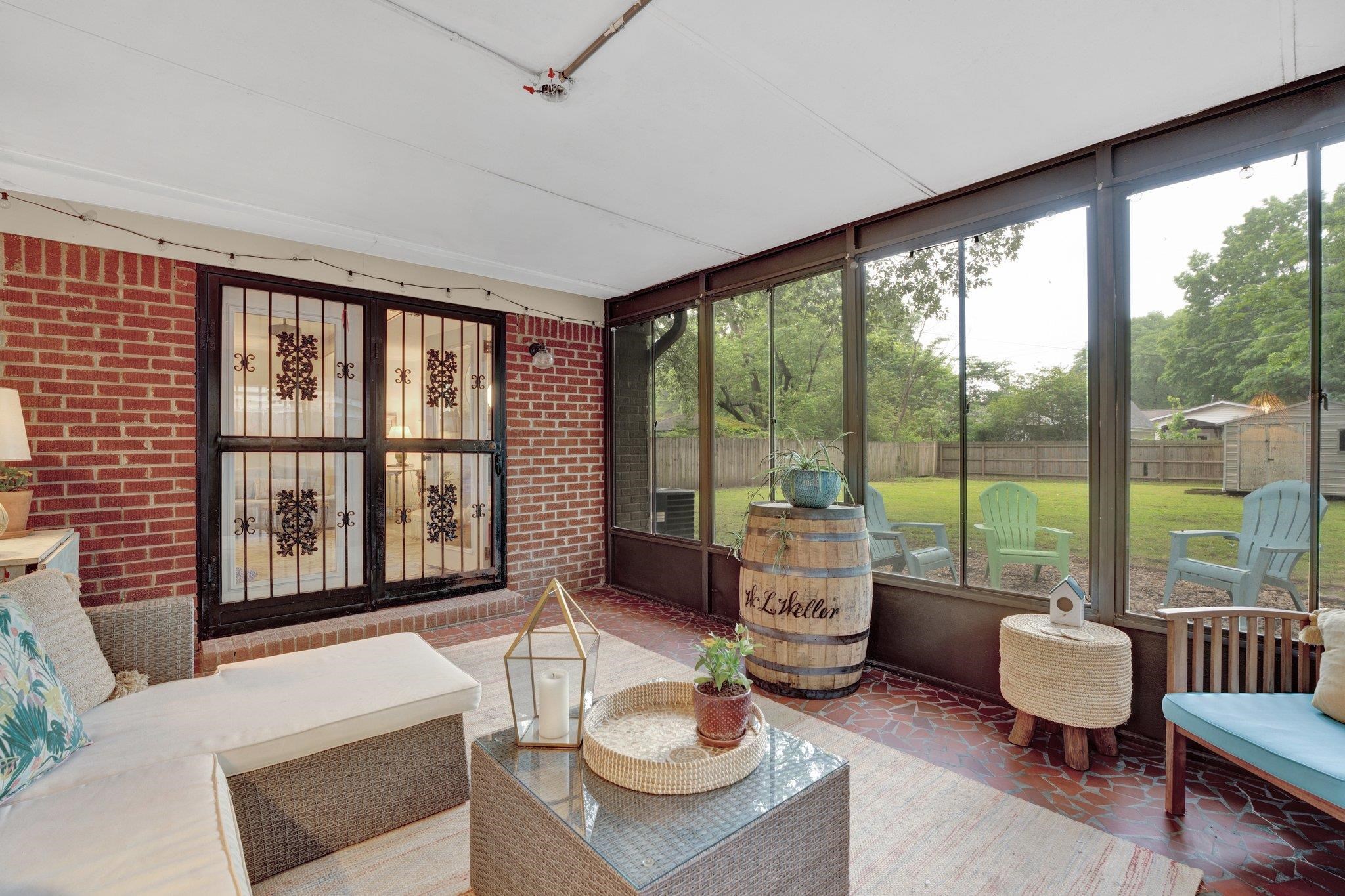 1459 Colonial Road Memphis, TN 38117 - Photo 26 of 33 a living room with furniture and a large window
