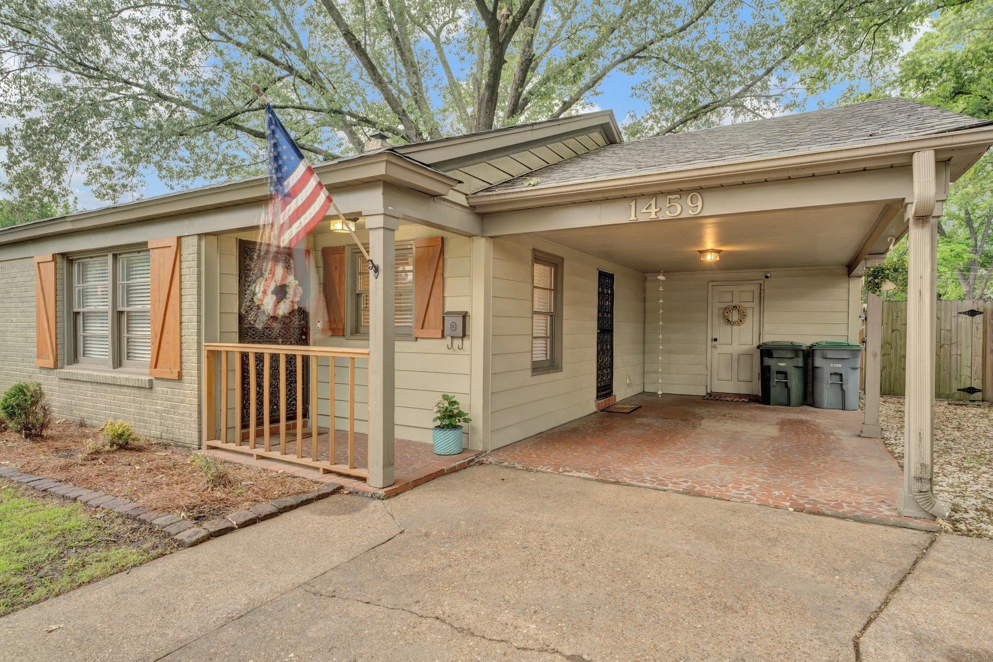 1459 Colonial Road Memphis, TN 38117 - Photo 3 of 33 a view of a house with a garage