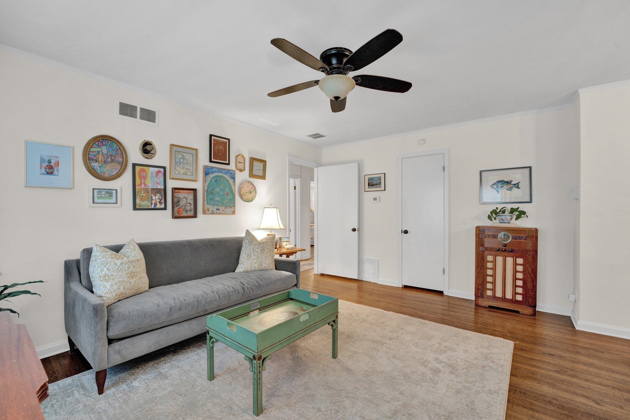 1459 Colonial Road Memphis, TN 38117 - Photo 5 of 33 a living room with furniture and a wooden floor
