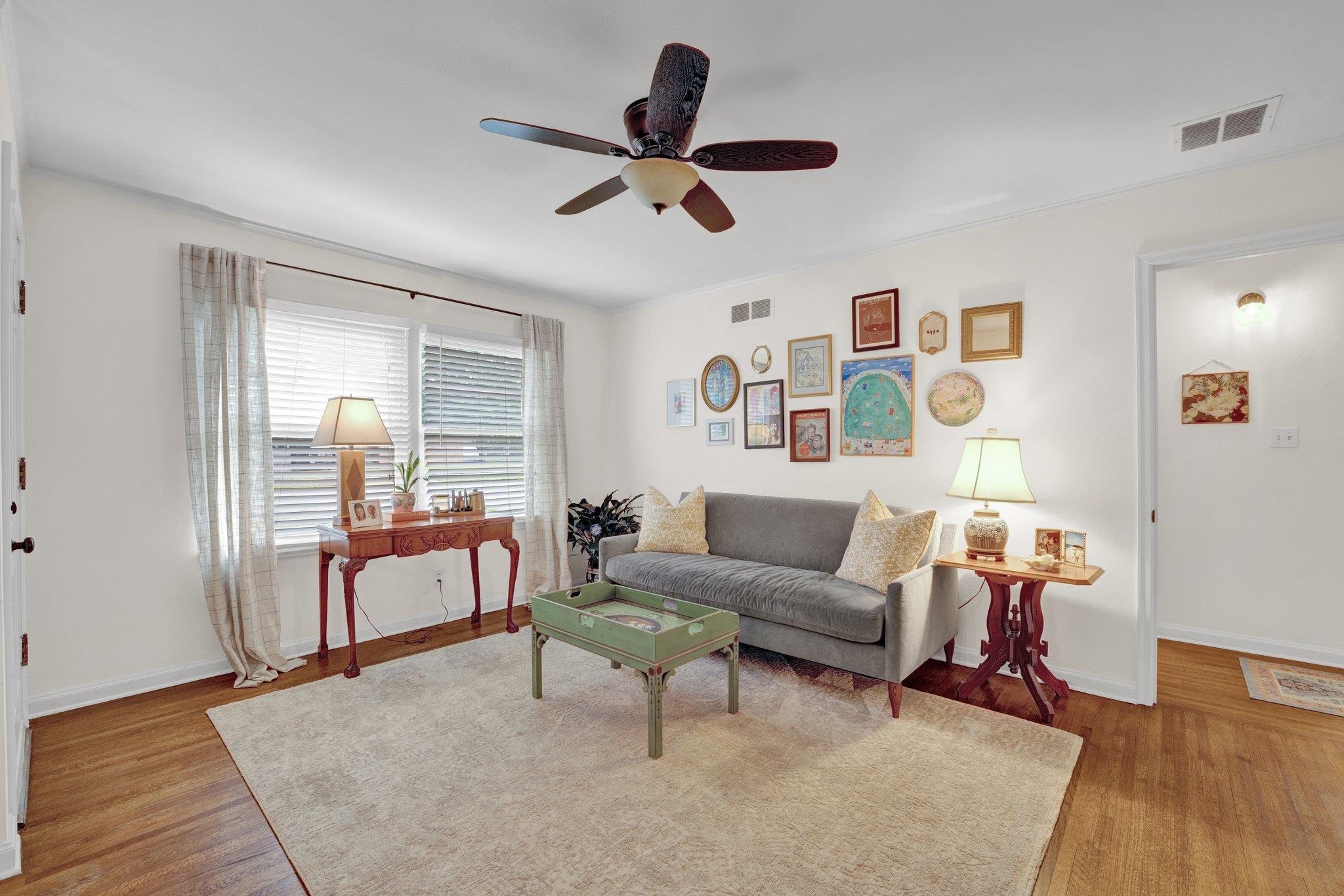 1459 Colonial Road Memphis, TN 38117 - Photo 6 of 33 a living room with furniture and wooden floor