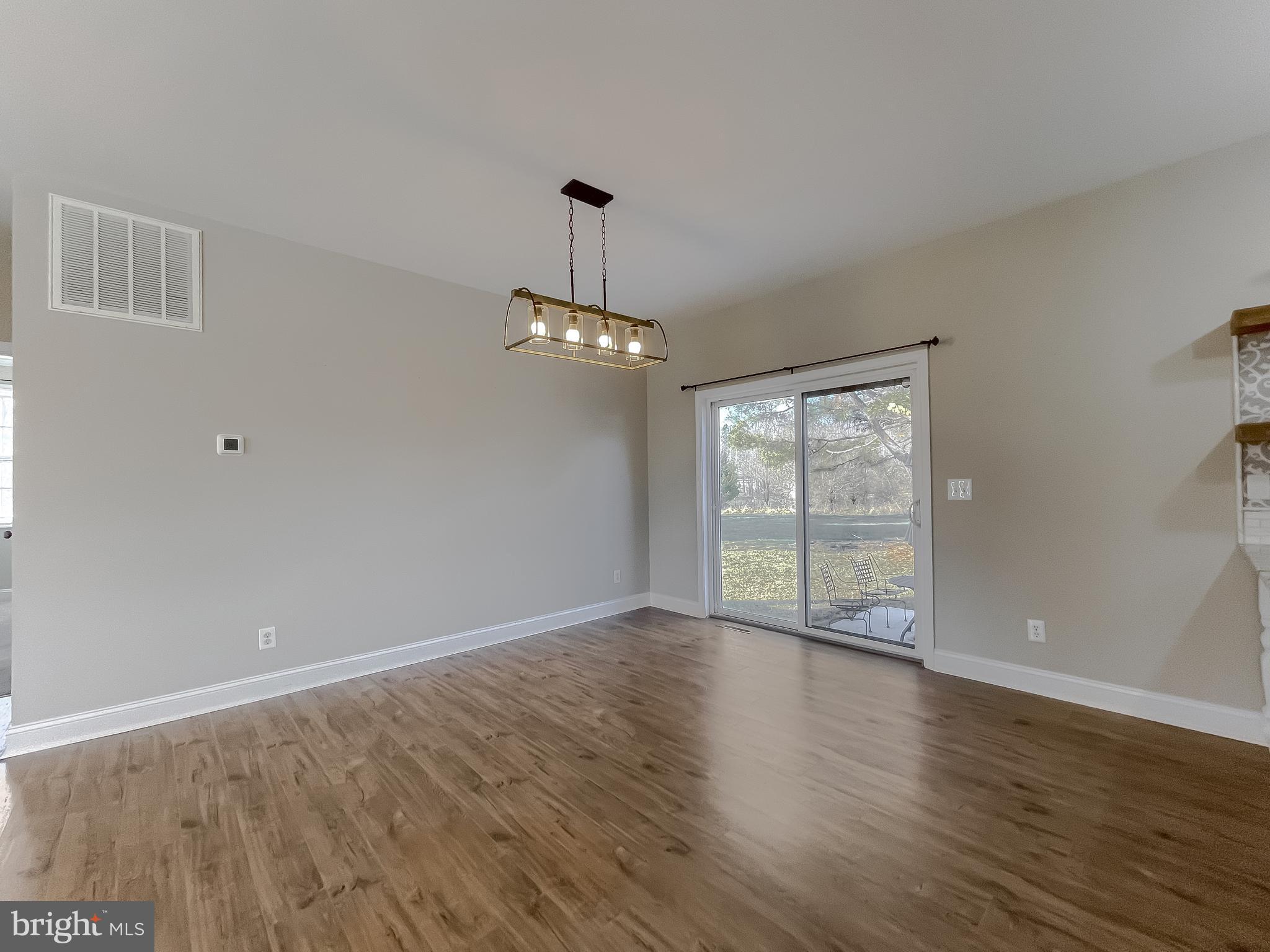 22030 Cartwright Road Leonardtown, MD 20650 - Photo 12 of 82 Dining room access to back yard