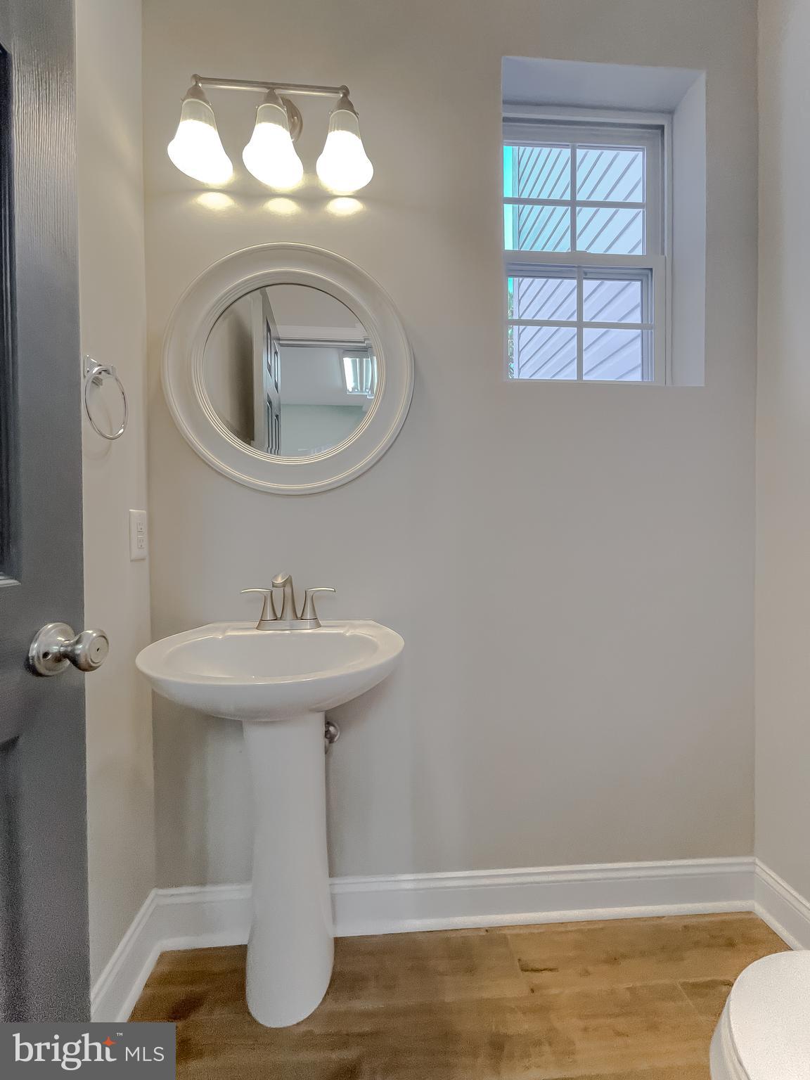 22030 Cartwright Road Leonardtown, MD 20650 - Photo 29 of 82 Half bath on main level