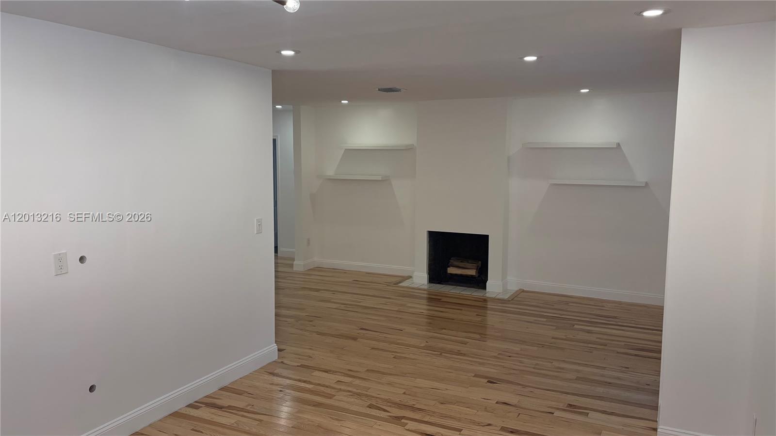 250 Southwest 19th Road Miami, FL 33129 - Photo 5 of 22 a view of an empty room with wooden floor