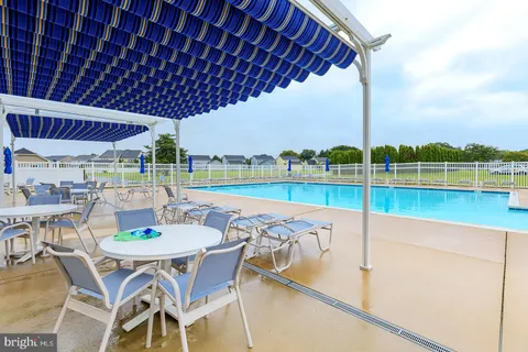 a view of an outdoor space with swimming pool