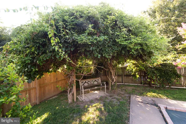 a view of swimming pool from a balcony