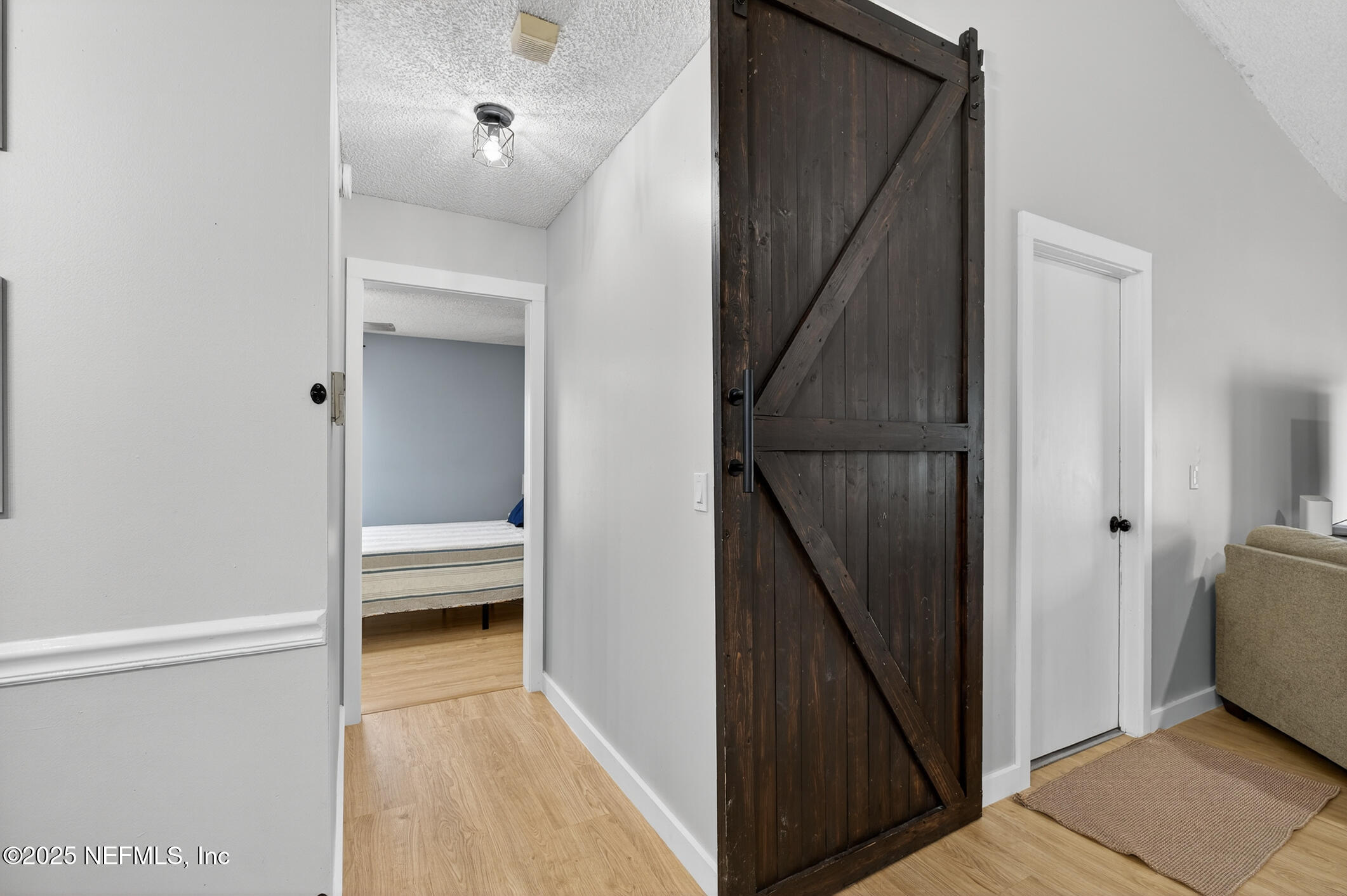 2172 Rothbury Drive Jacksonville, FL 32221 - Photo 15 of 28 a view of a hallway with a room and stairs
