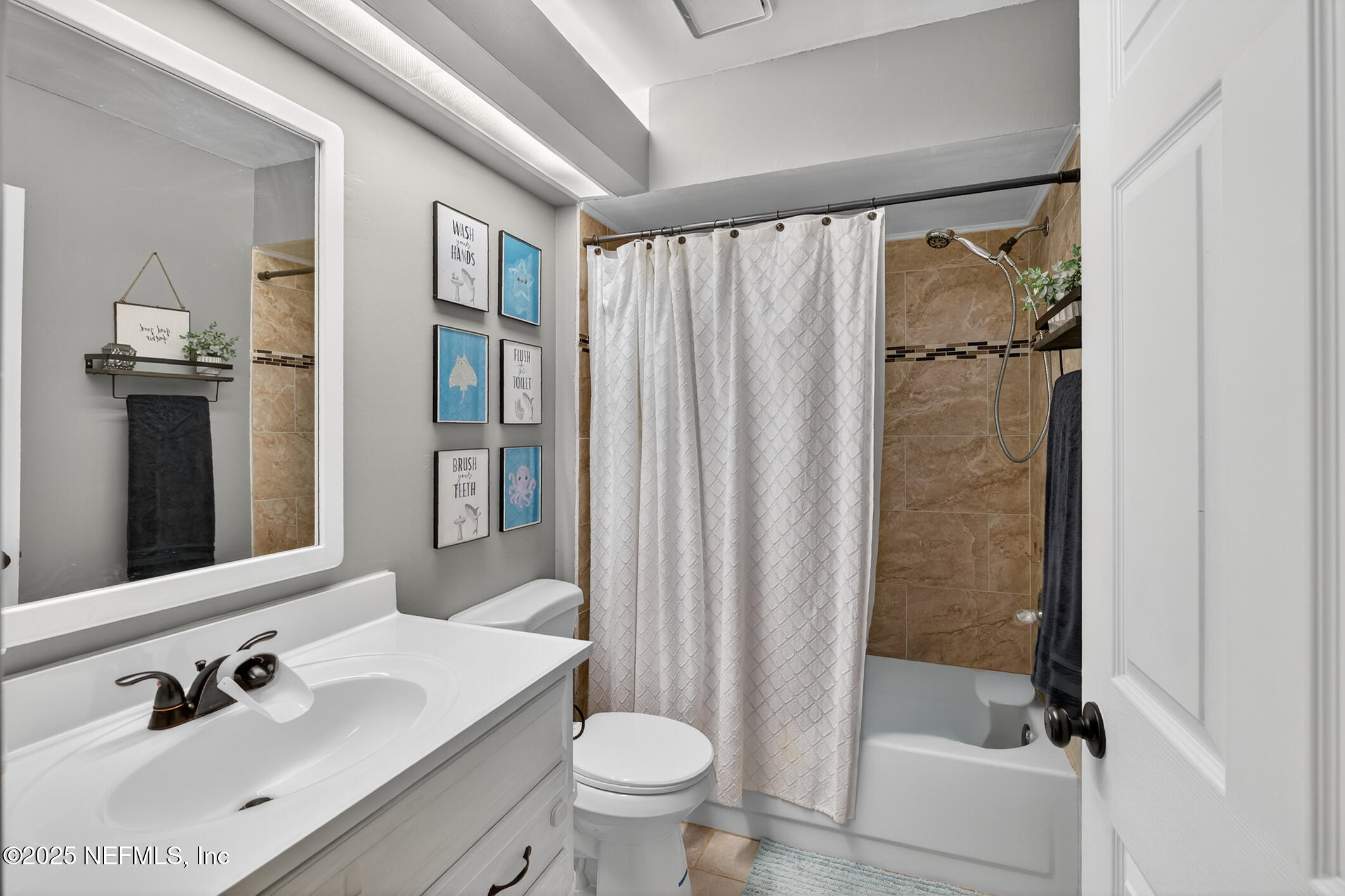 2172 Rothbury Drive Jacksonville, FL 32221 - Photo 20 of 28 a bathroom with a sink toilet and shower
