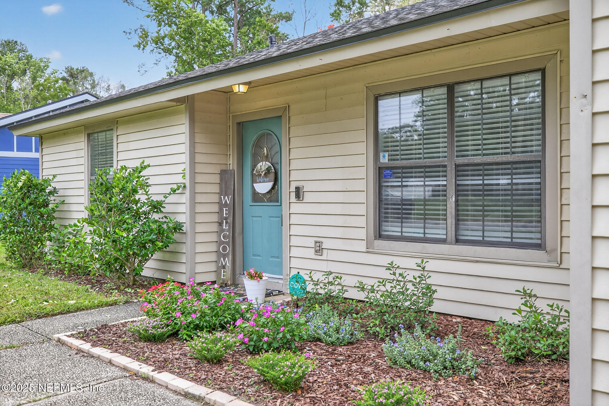 2172 Rothbury Drive Jacksonville, FL 32221 - Photo 2 of 28 a view of a house with a yard and sitting space
