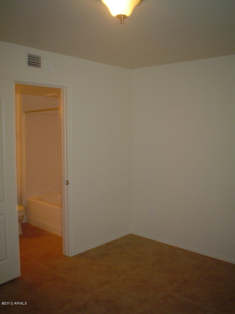 280 South Evergreen Road, Unit 1297 Tempe, AZ 85288 - Photo 13 of 33 1st floor bed with bath