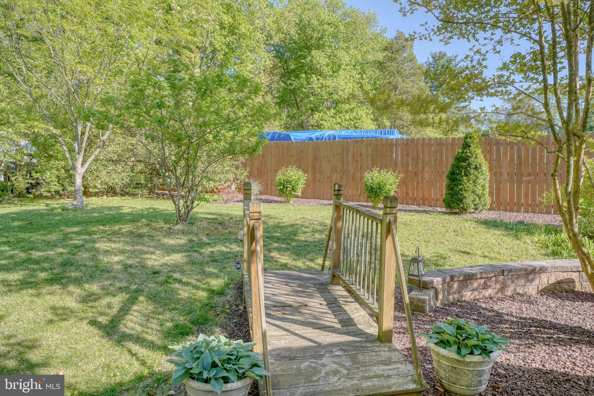 112 Tall Pines Road Newark, DE 19713 - Photo 19 of 62 a backyard of a house with lots of green space