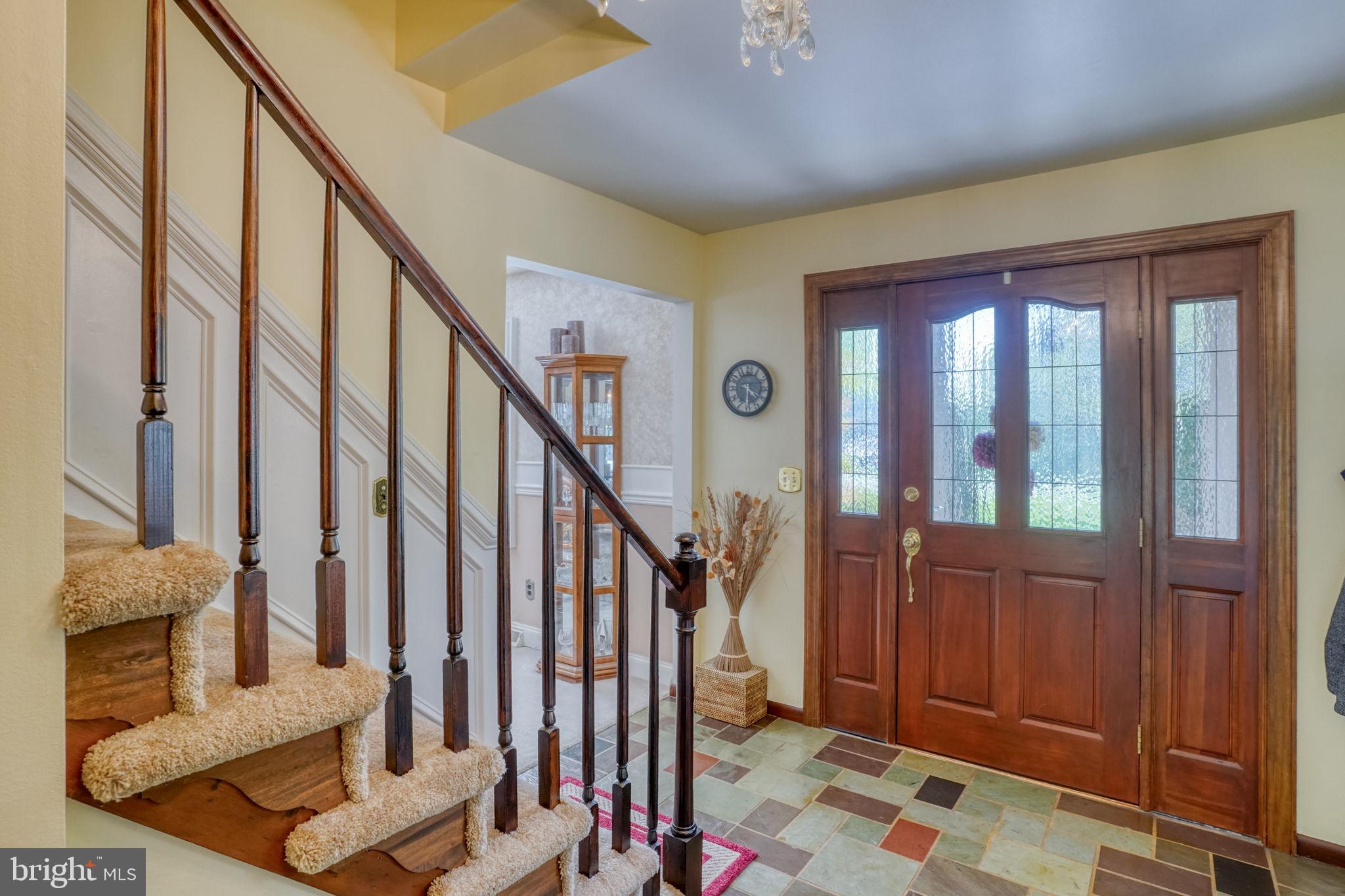 112 Tall Pines Road Newark, DE 19713 - Photo 27 of 62 a view of entryway with wooden floor and stairs
