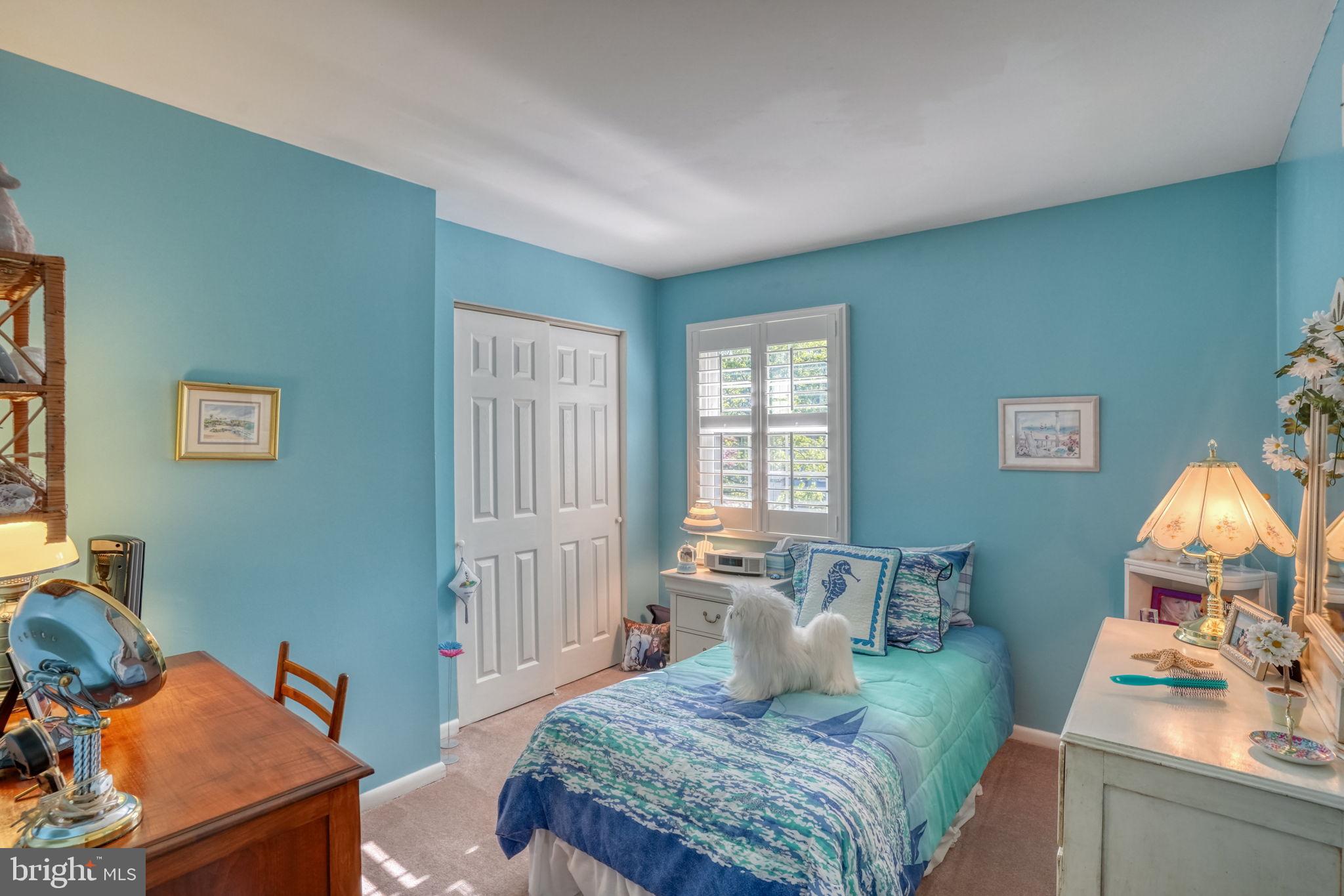 112 Tall Pines Road Newark, DE 19713 - Photo 56 of 62 a bedroom with a bed and wooden floor