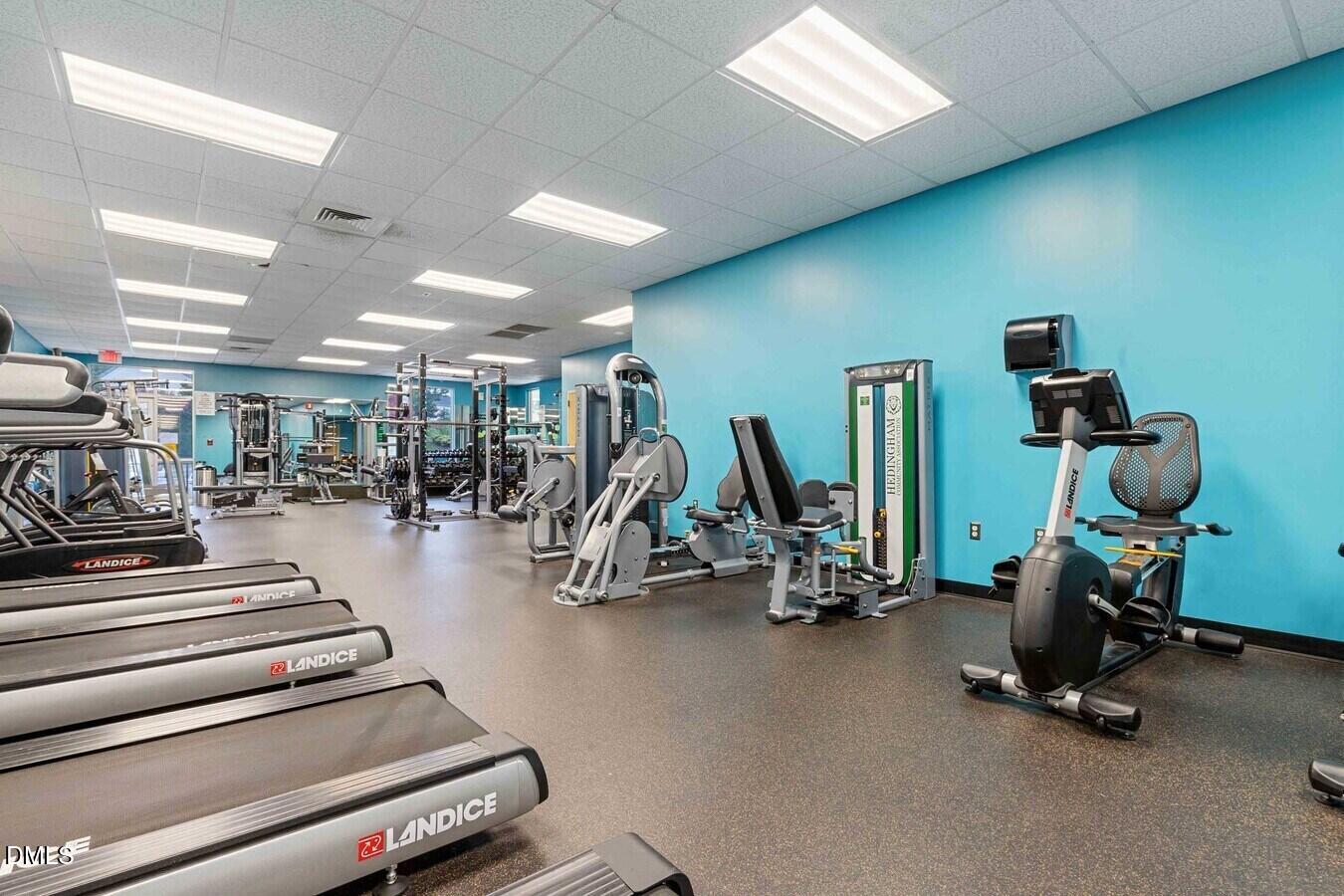 2101 Blackwolf Run Lane, Unit ST Raleigh, NC 27604 - Photo 18 of 30 a view of a room with gym equipment