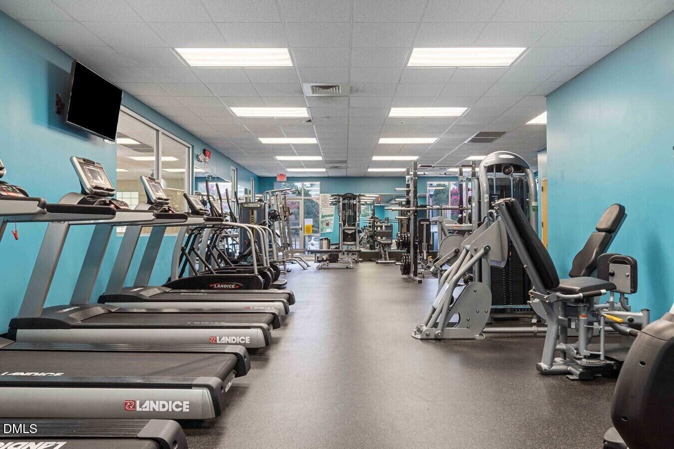 2101 Blackwolf Run Lane, Unit ST Raleigh, NC 27604 - Photo 19 of 30 a view of a room with gym equipment
