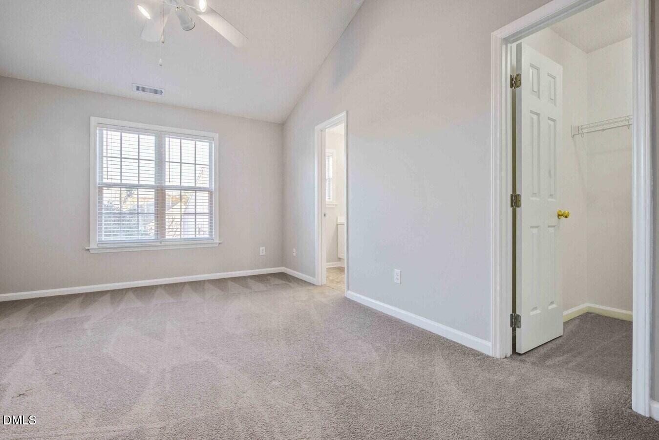2101 Blackwolf Run Lane, Unit ST Raleigh, NC 27604 - Photo 25 of 30 an empty room with windows and closet
