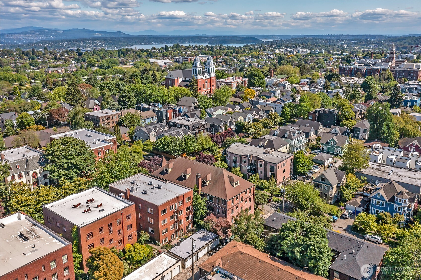 1101 17th Avenue, Unit 101 Seattle, WA 98122 - Photo 22 of 25 an aerial view of a city with lots of residential buildings
