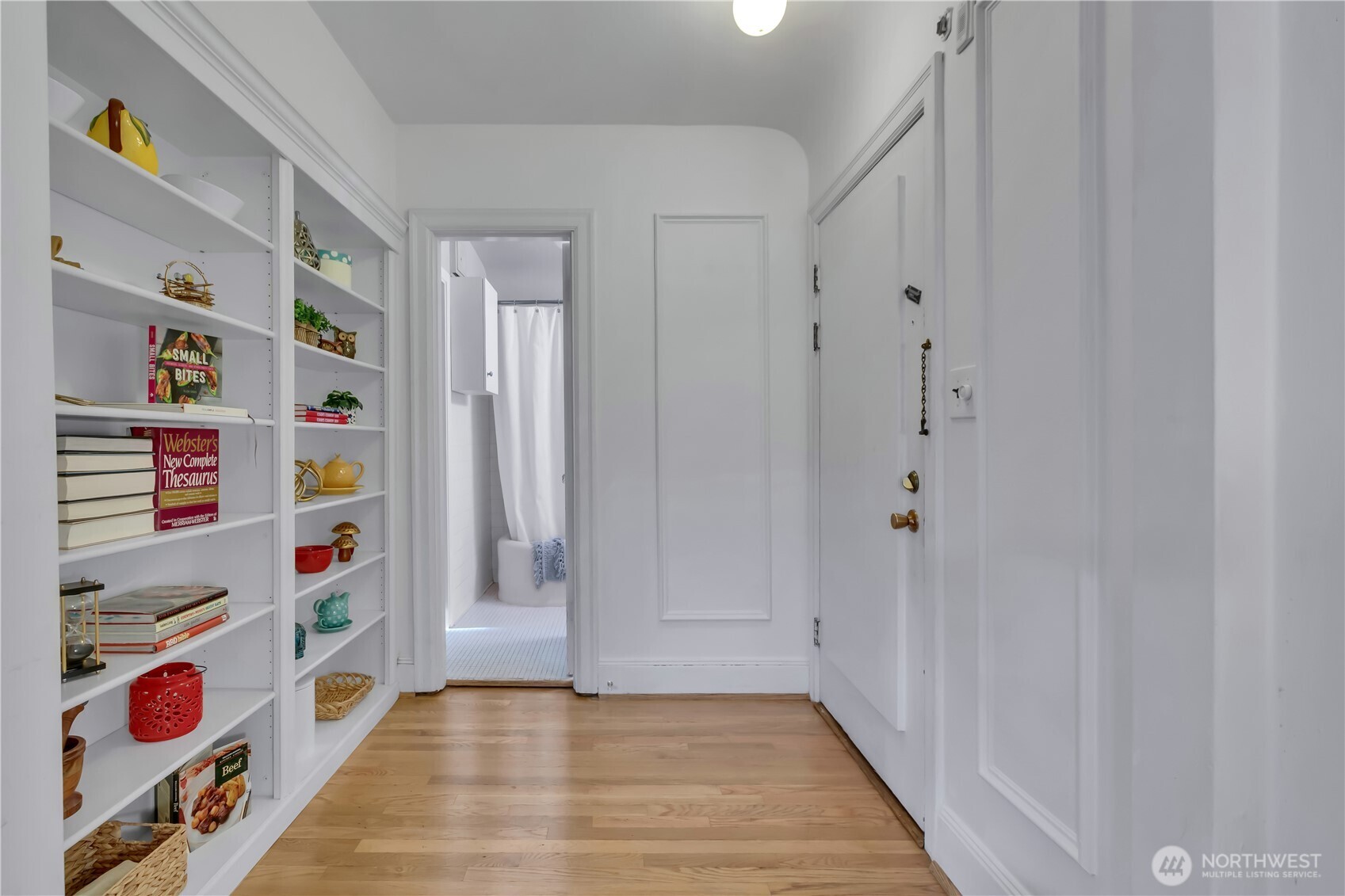1101 17th Avenue, Unit 101 Seattle, WA 98122 - Photo 10 of 25 a view of an entryway with lots of cabinet