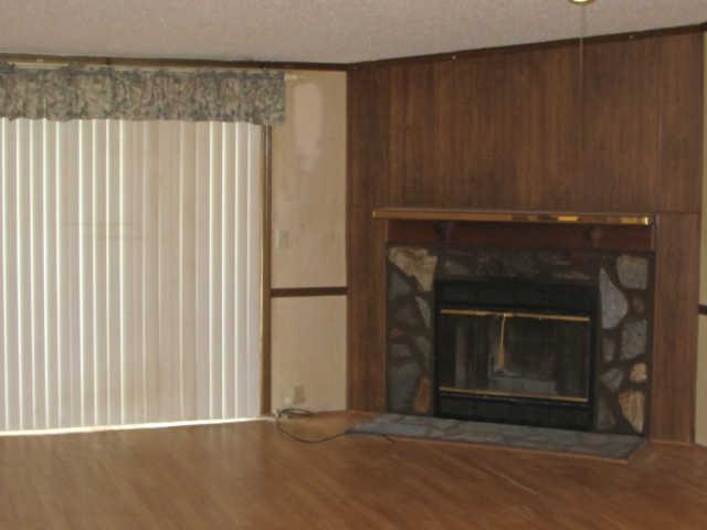 1135 Bubbling Well Road Madison, TN 37115 - Photo 2 of 11 Huge living room with a wood burning fireplace!