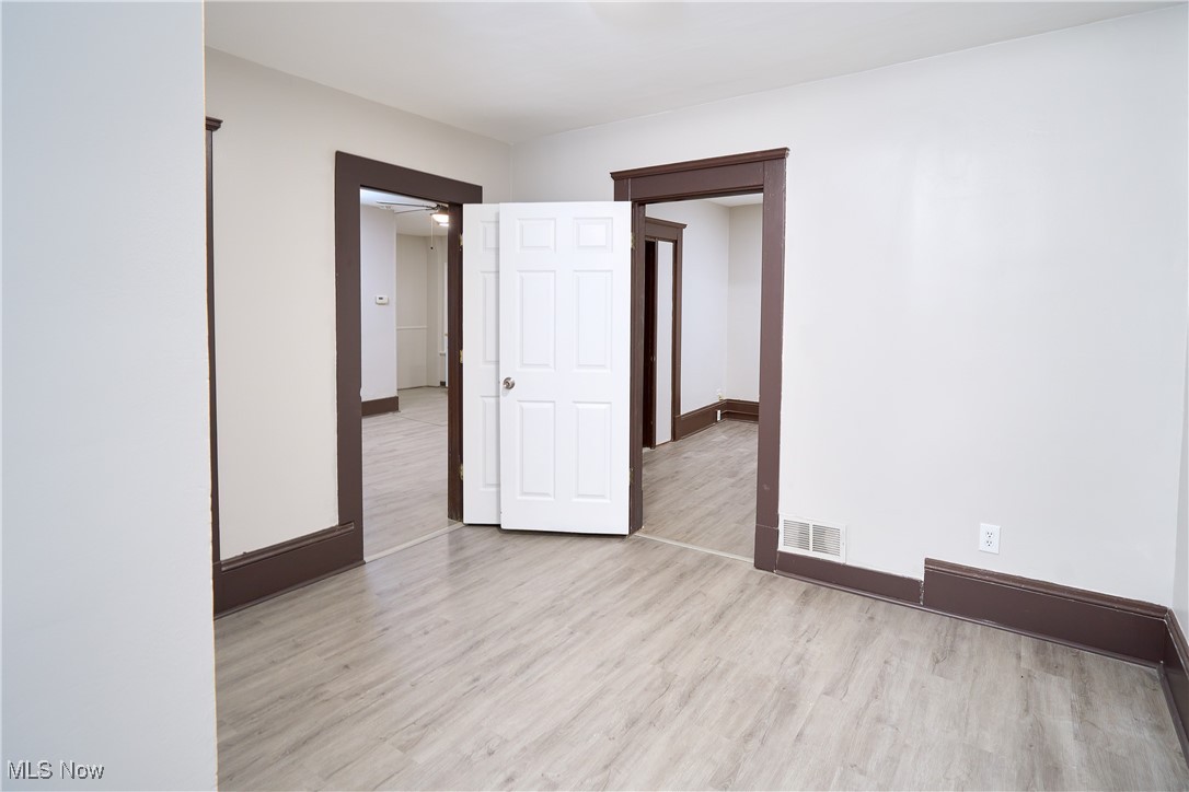 5432 State Road Parma, OH 44134 - Photo 40 of 47 Unfurnished room featuring light wood finished floors and baseboards