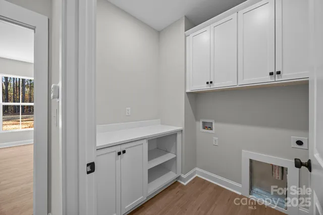 a view of cabinets and window