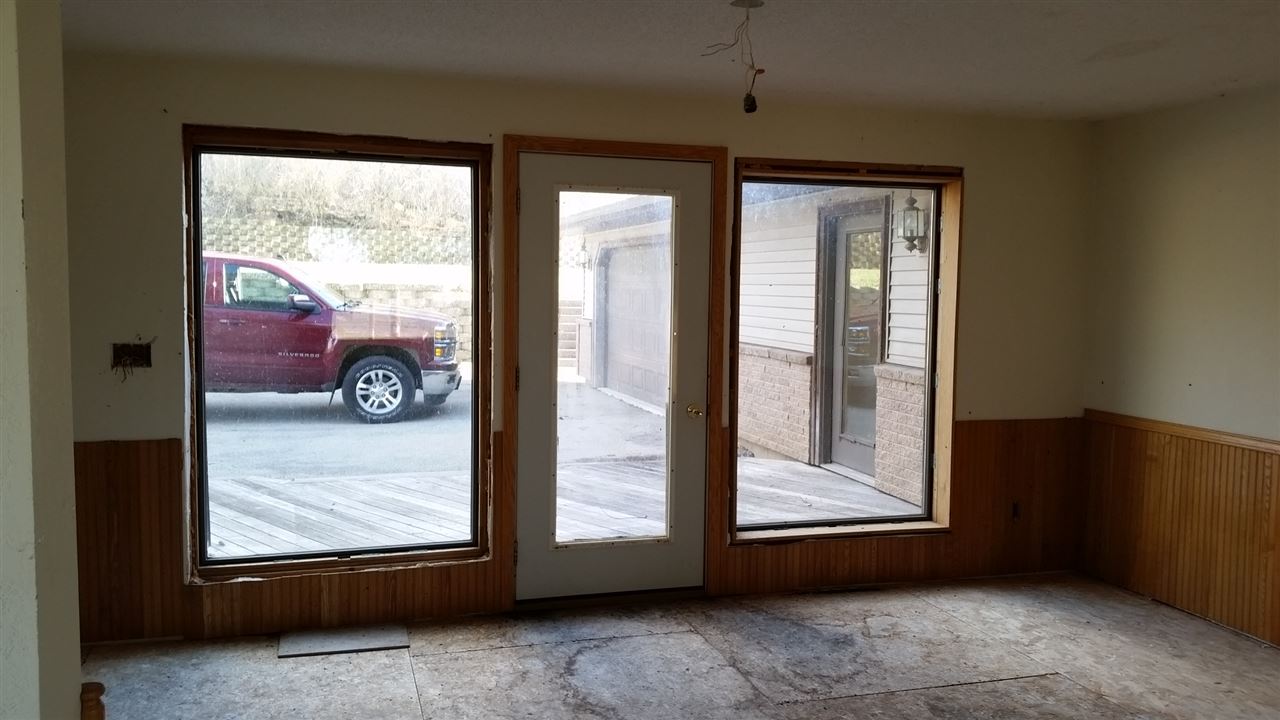 15946 East State Line Road Durand, IL 61024 - Photo 19 of 25 a view of an empty room with a window