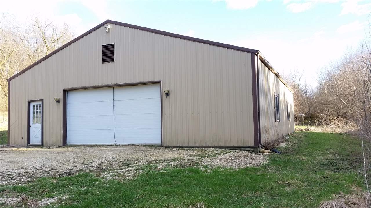 15946 East State Line Road Durand, IL 61024 - Photo 23 of 25 a backyard of a house