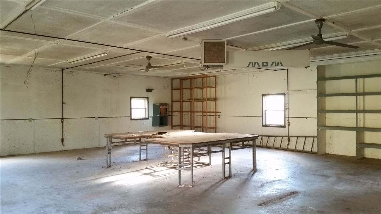 15946 East State Line Road Durand, IL 61024 - Photo 24 of 25 a dining room with a table and chairs