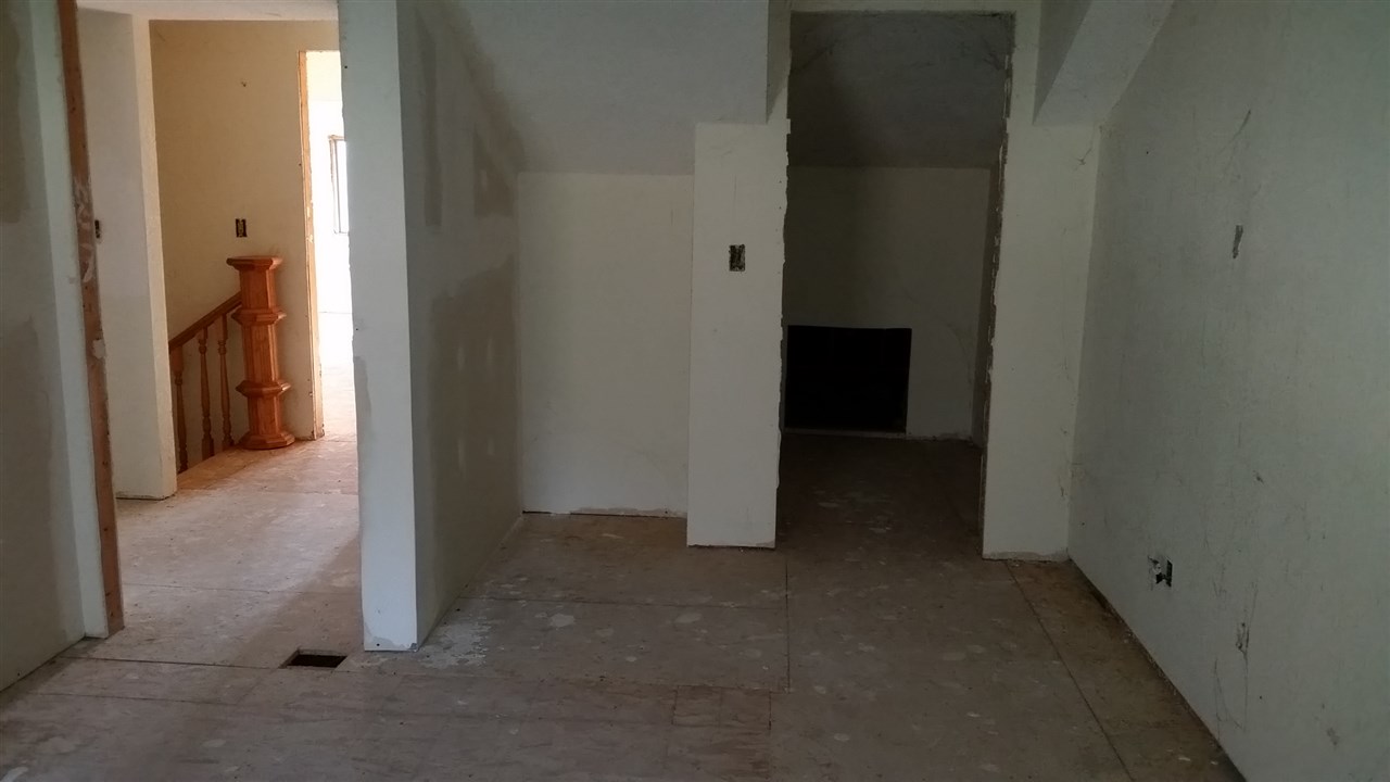 15946 East State Line Road Durand, IL 61024 - Photo 5 of 25 a view of a hallway with closet