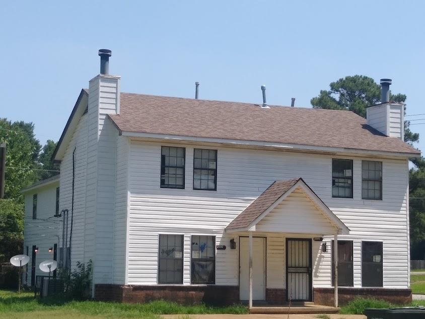 3596 Christine Road Memphis, TN 38118 - Photo 1 of 1 a front view of a house with a yard