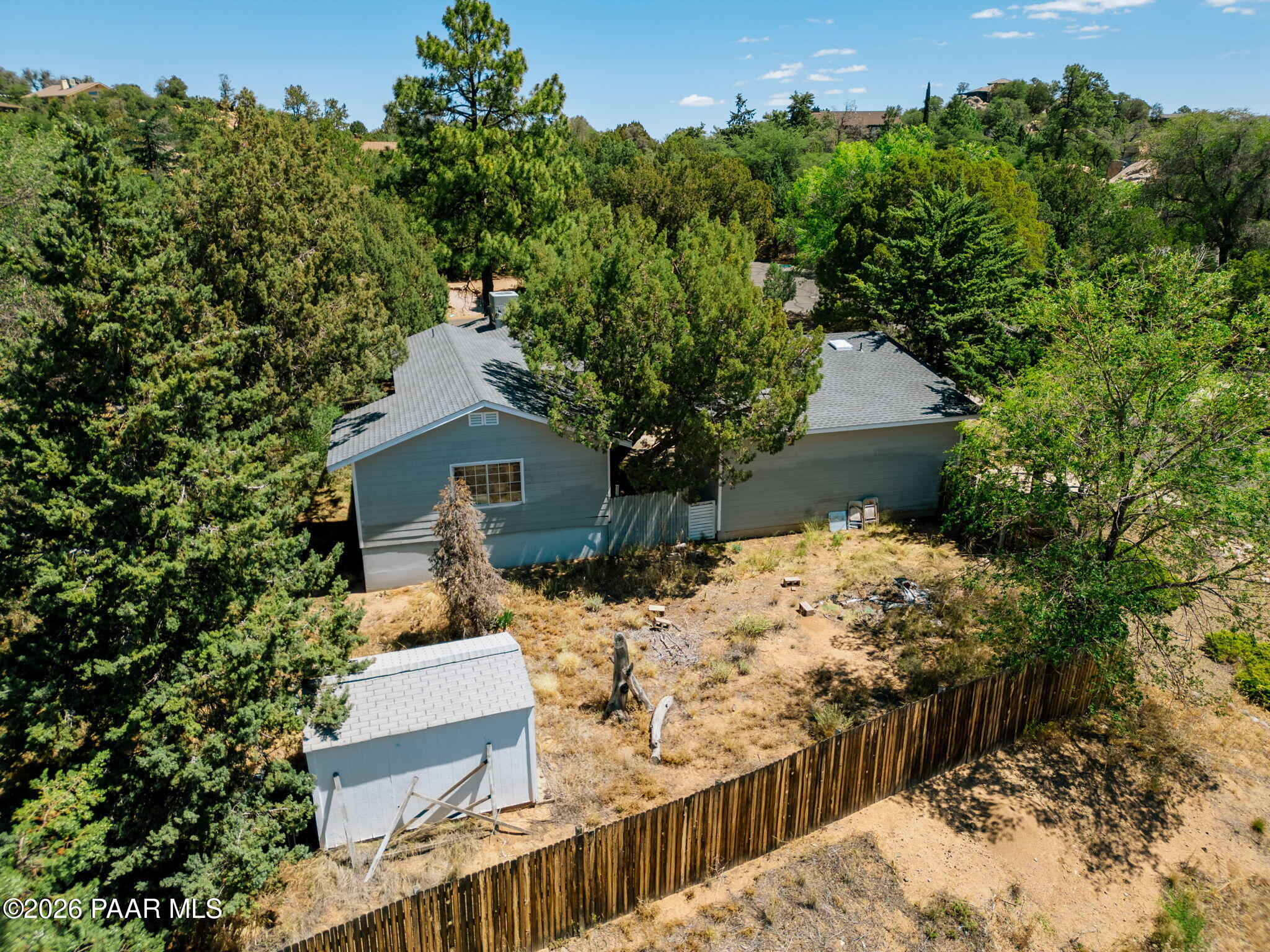 1710 Grandview Road Prescott, AZ 86305 - Photo 32 of 47 a view of a wooden house with a yard