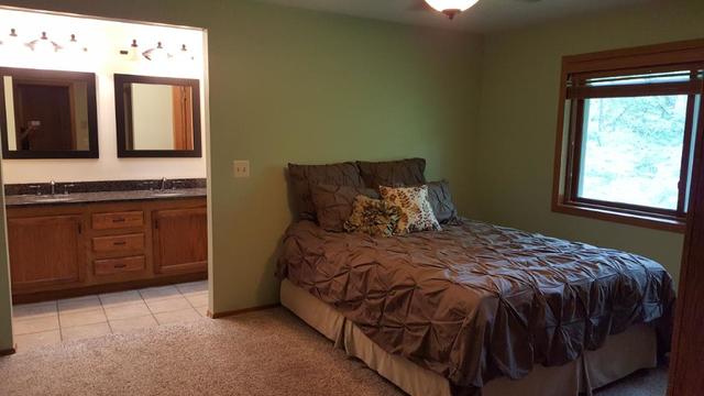 2052 North 3639th Road Serena, IL 60549 - Photo 4 of 15 a bedroom with a bed dresser and a window