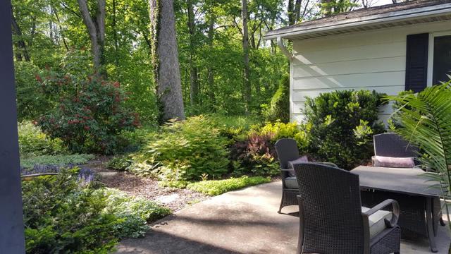 2052 North 3639th Road Serena, IL 60549 - Photo 6 of 15 a view of a patio with table and chairs and potted plants