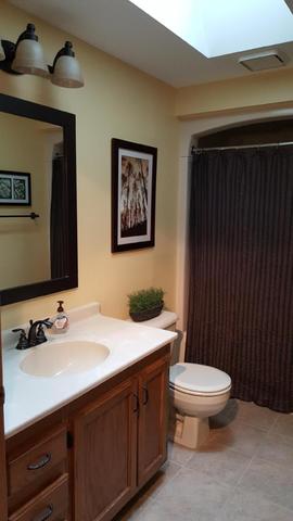 2052 North 3639th Road Serena, IL 60549 - Photo 10 of 15 a bathroom with a sink a toilet and mirror
