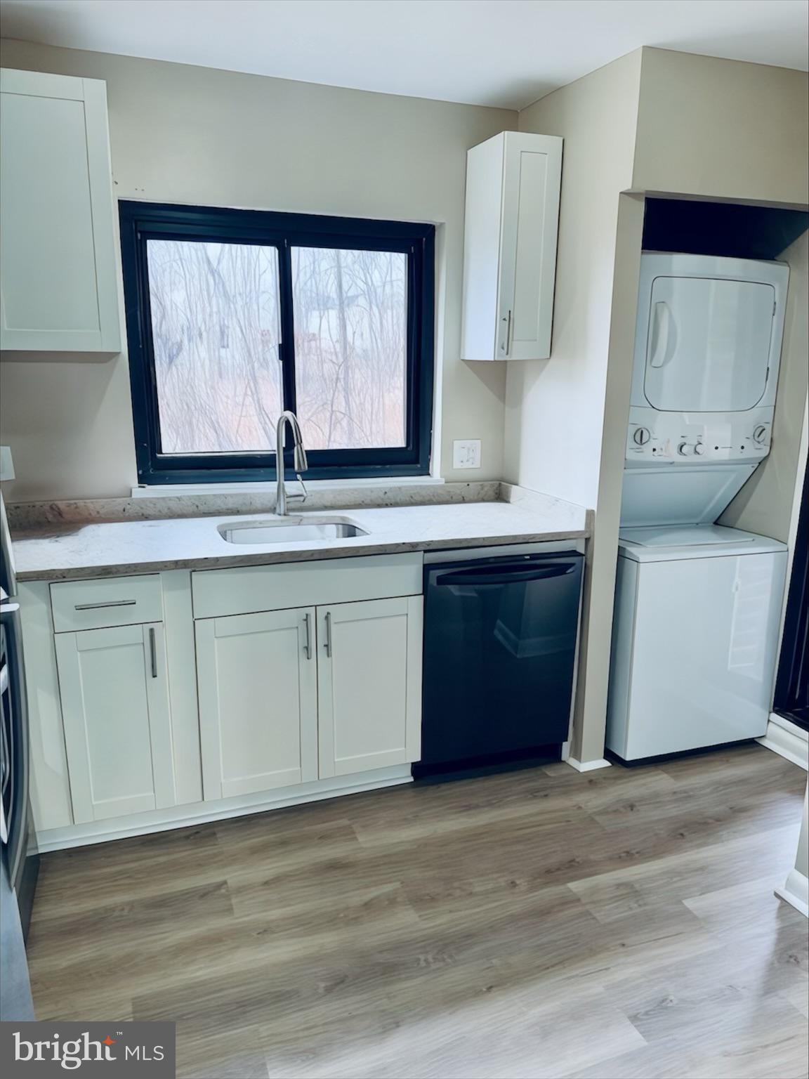 15712 Dorset Road, Unit 198 Laurel, MD 20707 - Photo 12 of 35 a view of cabinets a sink and a window in a room