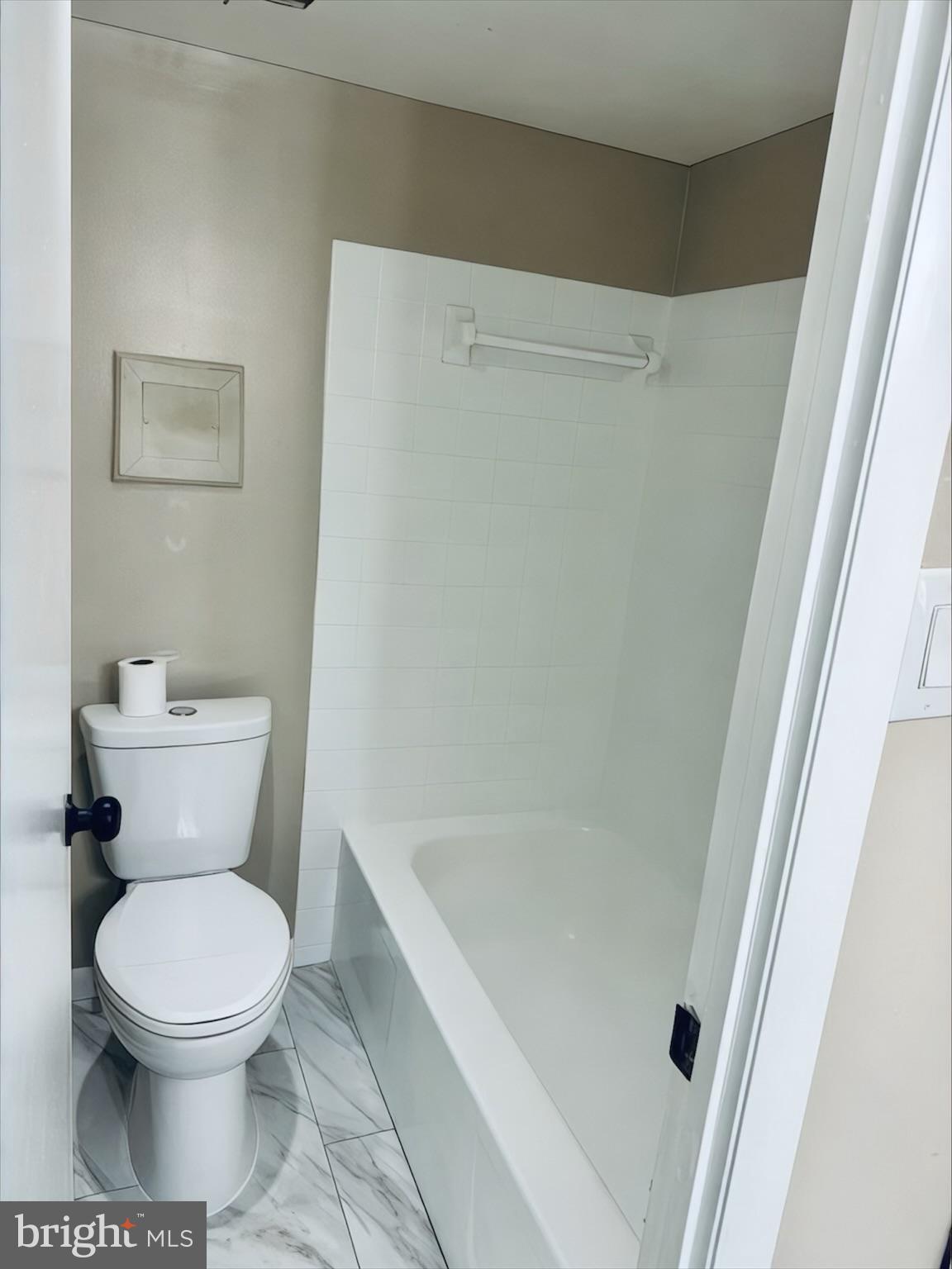 15712 Dorset Road, Unit 198 Laurel, MD 20707 - Photo 14 of 35 a white toilet sitting next to a white sink