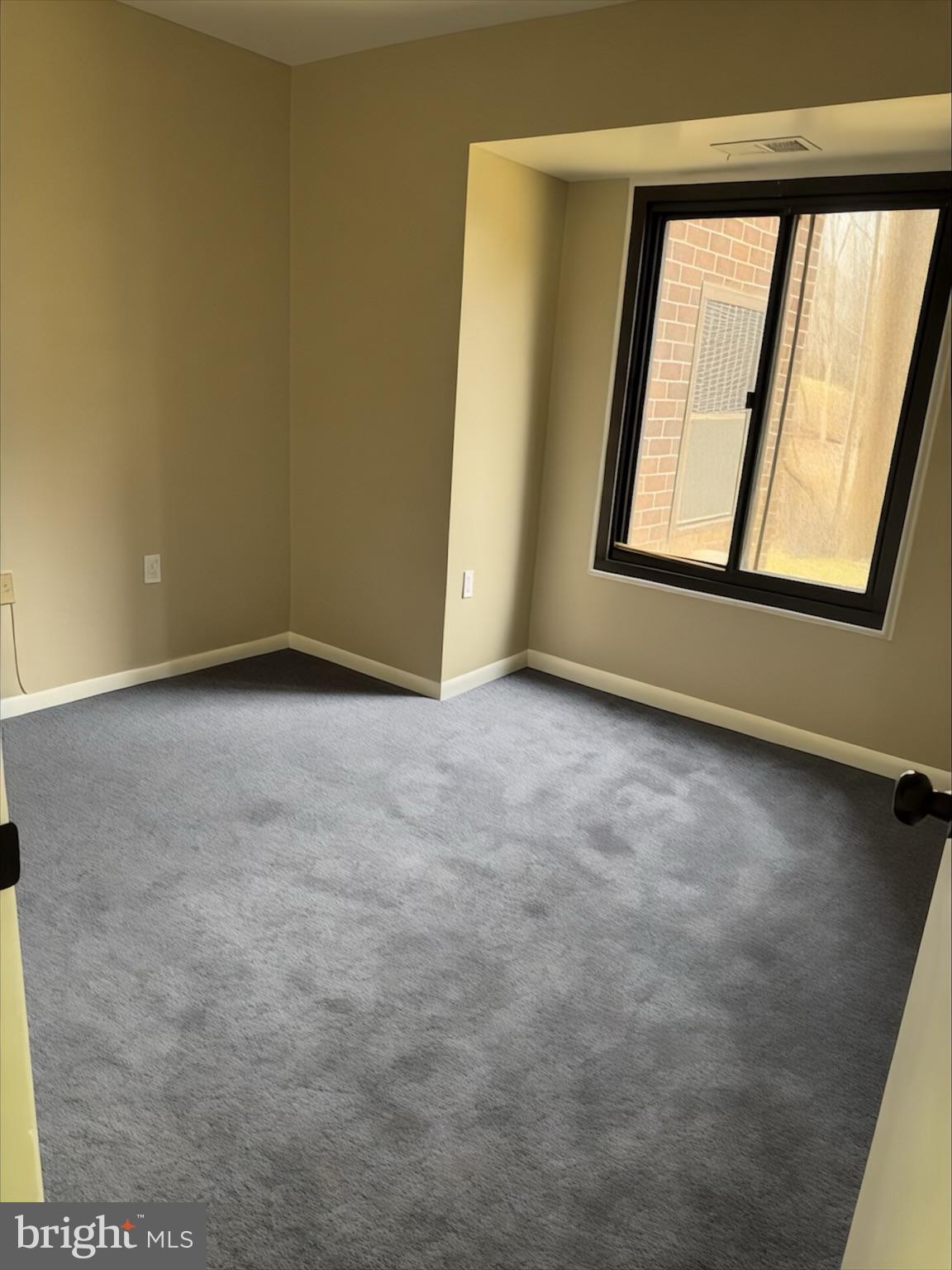 15712 Dorset Road, Unit 198 Laurel, MD 20707 - Photo 24 of 35 an empty room with windows