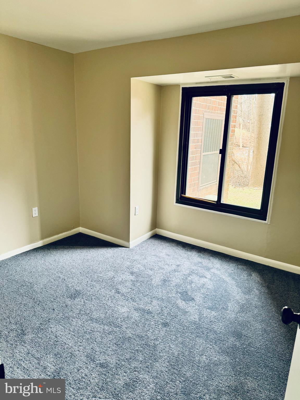 15712 Dorset Road, Unit 198 Laurel, MD 20707 - Photo 28 of 35 an empty room with window