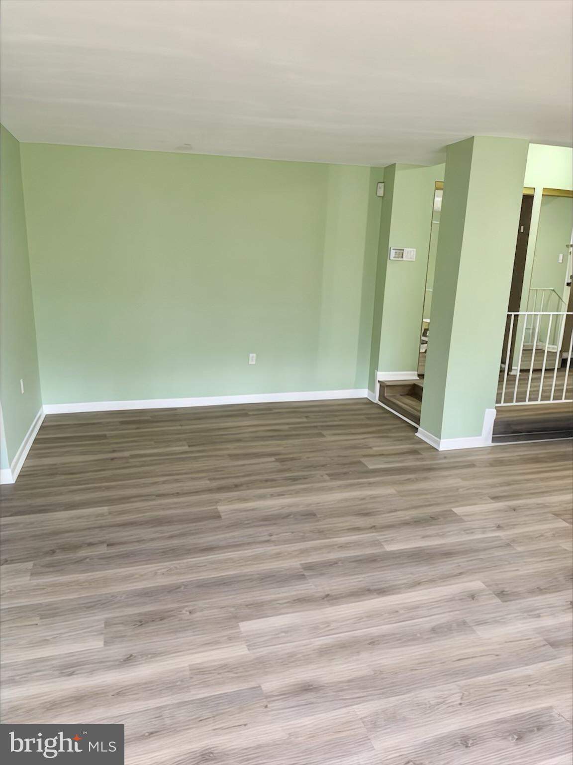 15712 Dorset Road, Unit 198 Laurel, MD 20707 - Photo 4 of 35 a view of a room with wooden floor