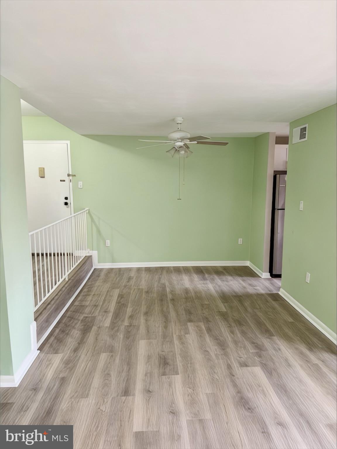 15712 Dorset Road, Unit 198 Laurel, MD 20707 - Photo 5 of 35 a view of a room with wooden floor