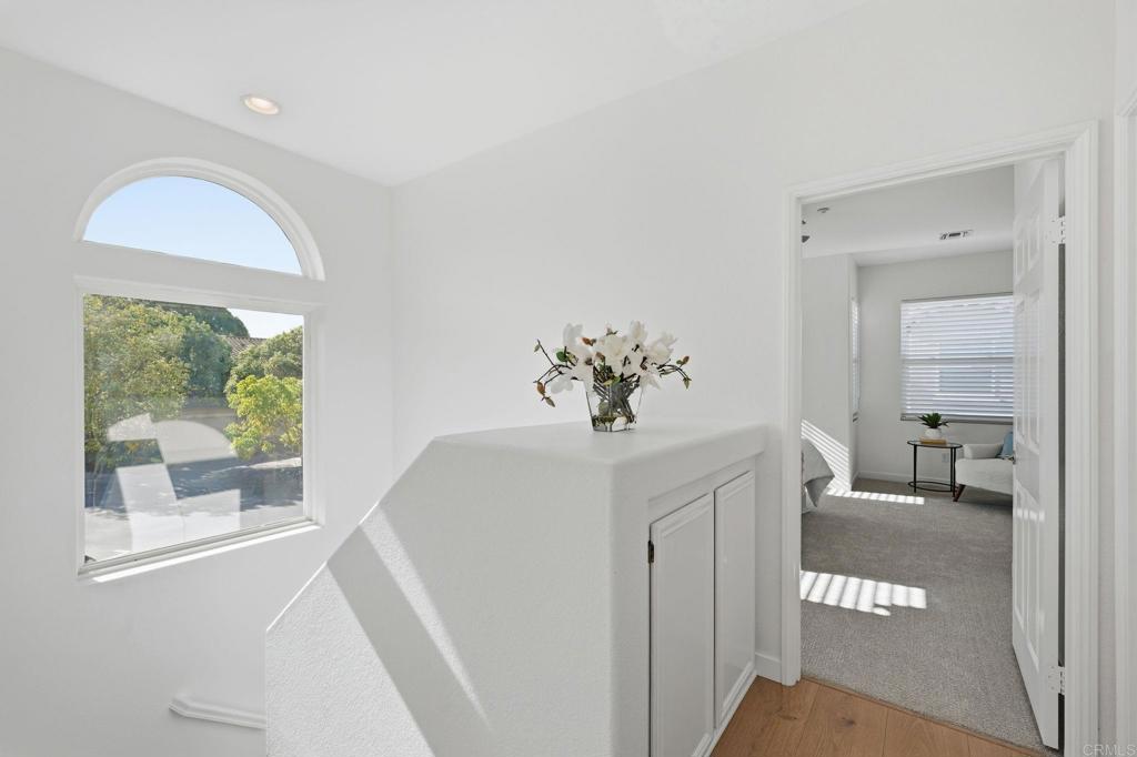 6180 Citracado Circle Carlsbad, CA 92009 - Photo 27 of 42 a view of livingroom with furniture and windows