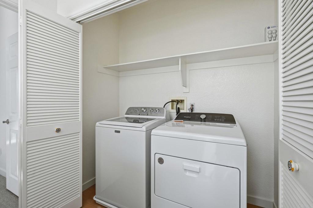 6180 Citracado Circle Carlsbad, CA 92009 - Photo 28 of 42 a utility room with dryer and washer