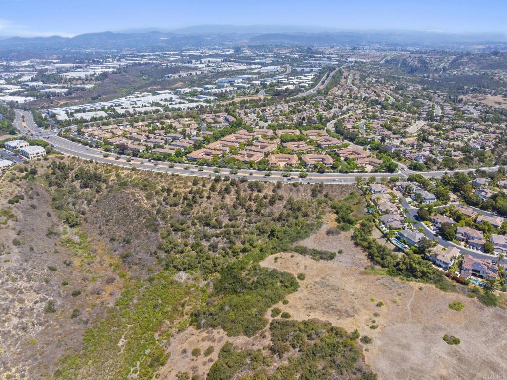 6180 Citracado Circle Carlsbad, CA 92009 - Photo 40 of 42 an aerial view of residential houses with outdoor space