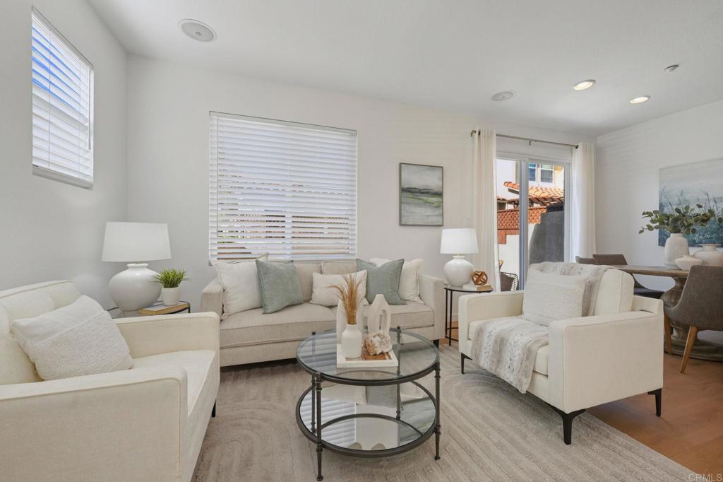 6180 Citracado Circle Carlsbad, CA 92009 - Photo 4 of 42 a living room with furniture and a large window