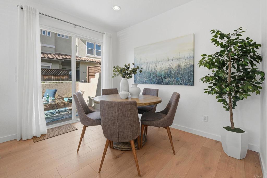 6180 Citracado Circle Carlsbad, CA 92009 - Photo 7 of 42 a view of a dining room with furniture and window